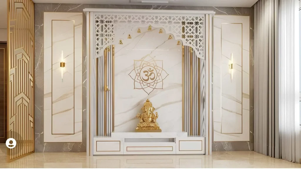 The brass and gold-accented marble mandir design